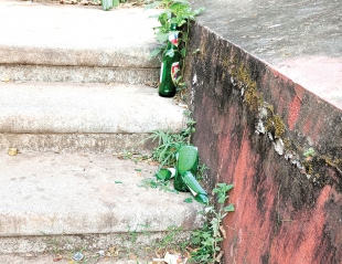 Liquor bottles and beer cans leave daily testimonies  of public drinking in the Fontainhas heritage belt