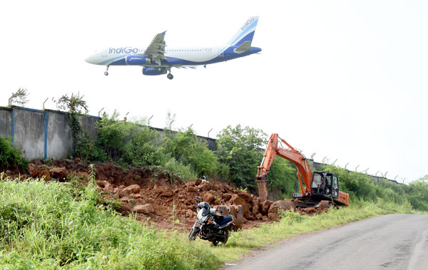 SECURITY BREACH? Excavator digging along airport wall but authorities clueless