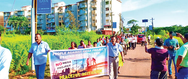Opposition to mega housing project  behind MES College building up