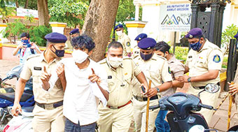 Police detain NSUI members protesting the holding of scheduled board exams