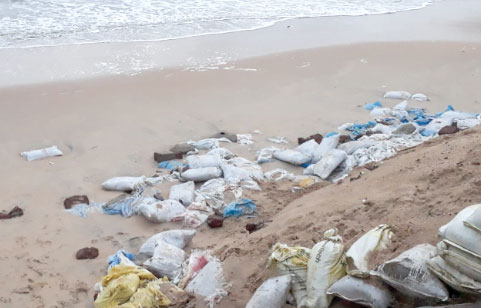 Sernabatim, Benaulim  beaches littered with sandbags 