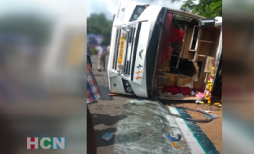 2 rescued after bus falls on its side at Borim circle