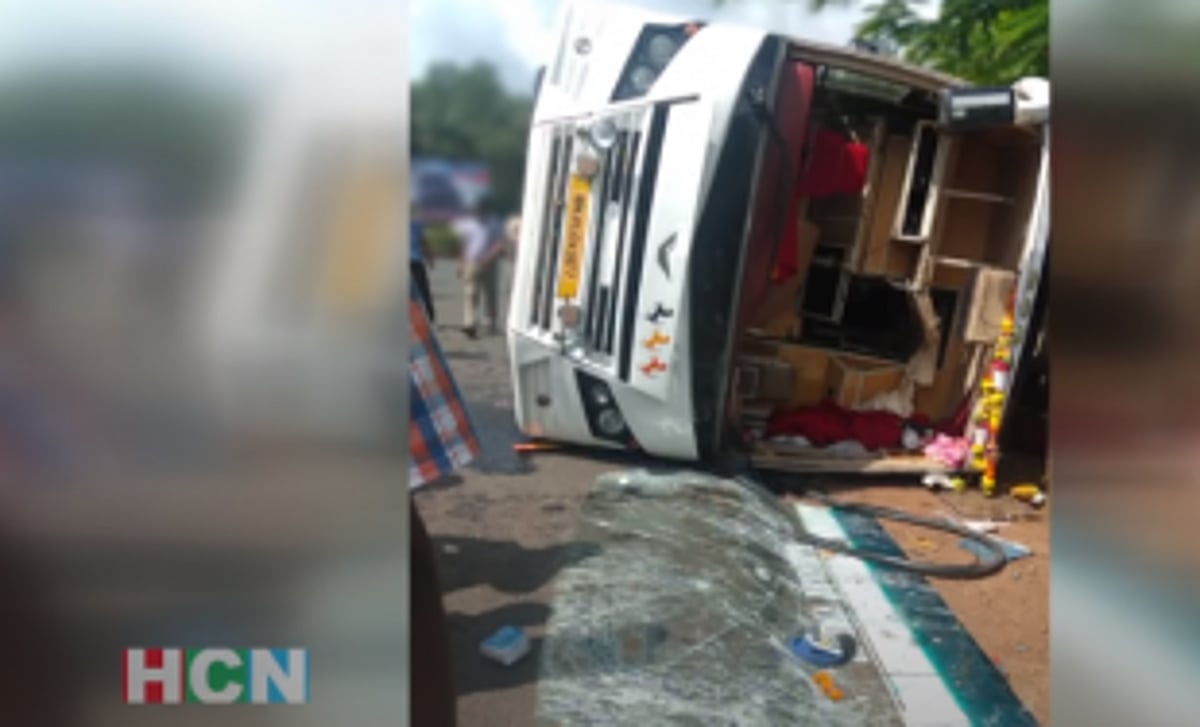2 rescued after bus falls on  its side at  Borim circle