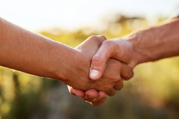 A LAUREL AND HEARTY HANDSHAKE