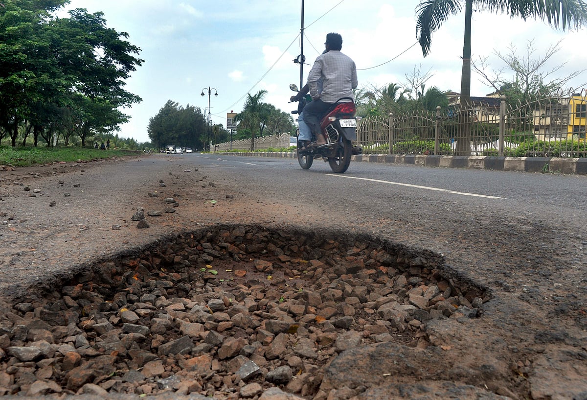 A big pothole on the busy Dr Jack Sequeira road at Mira Mar which is posing death trap to motorists. Many other potholes are visible on the same stretch of the road.