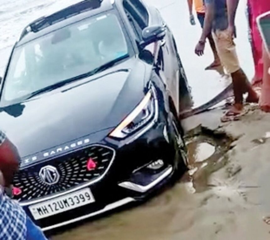 A car is not a beach vehicle, but this MH number plated car owner doesn’t know that