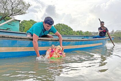 A cherished tradition: Devotees
bid farewell to Bappa