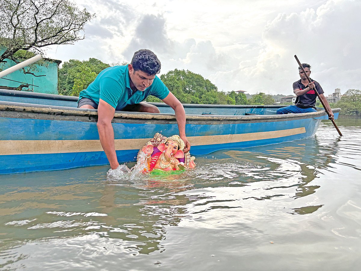 A cherished tradition: Devotees
bid farewell to Bappa