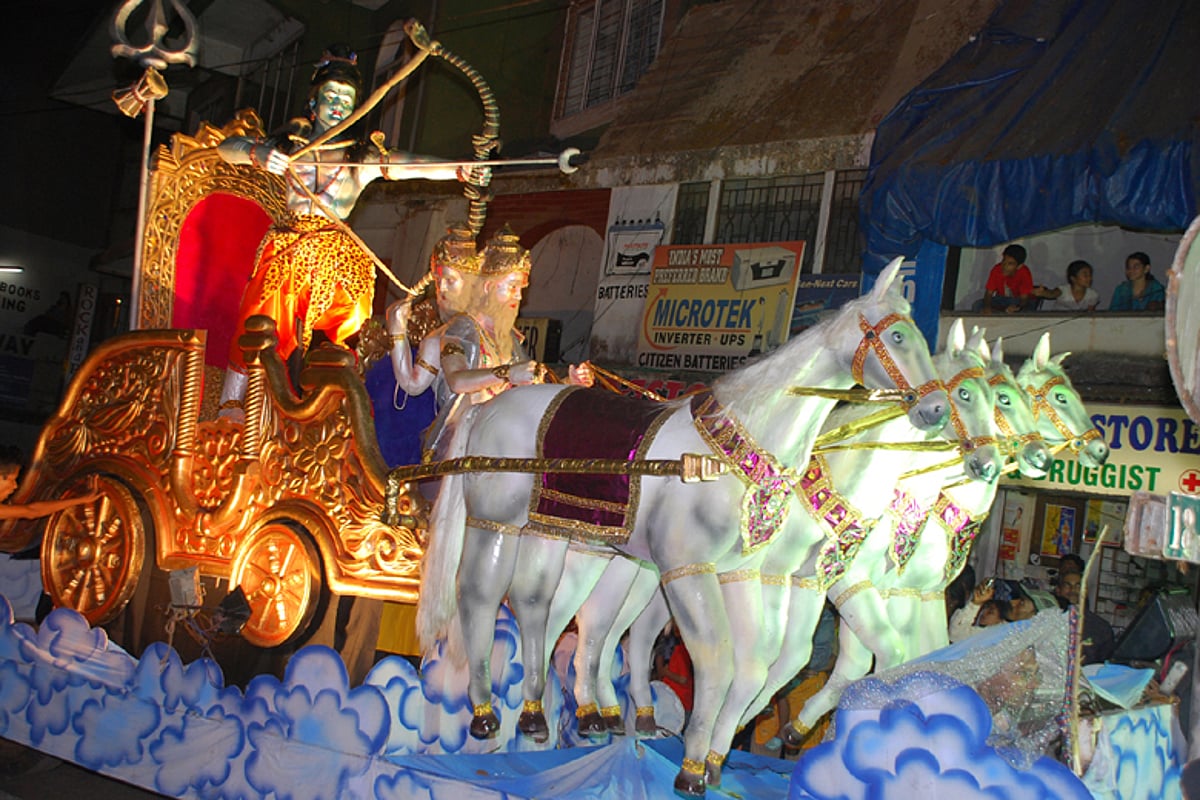 A float depicting a scene from the Hindu mythology makes its way along the 18th June Road in the city on Saturday. Over 25 floats showcasing the rich tradition of Indian culture and communal harmony were part of Shigmotsav that got underway today.