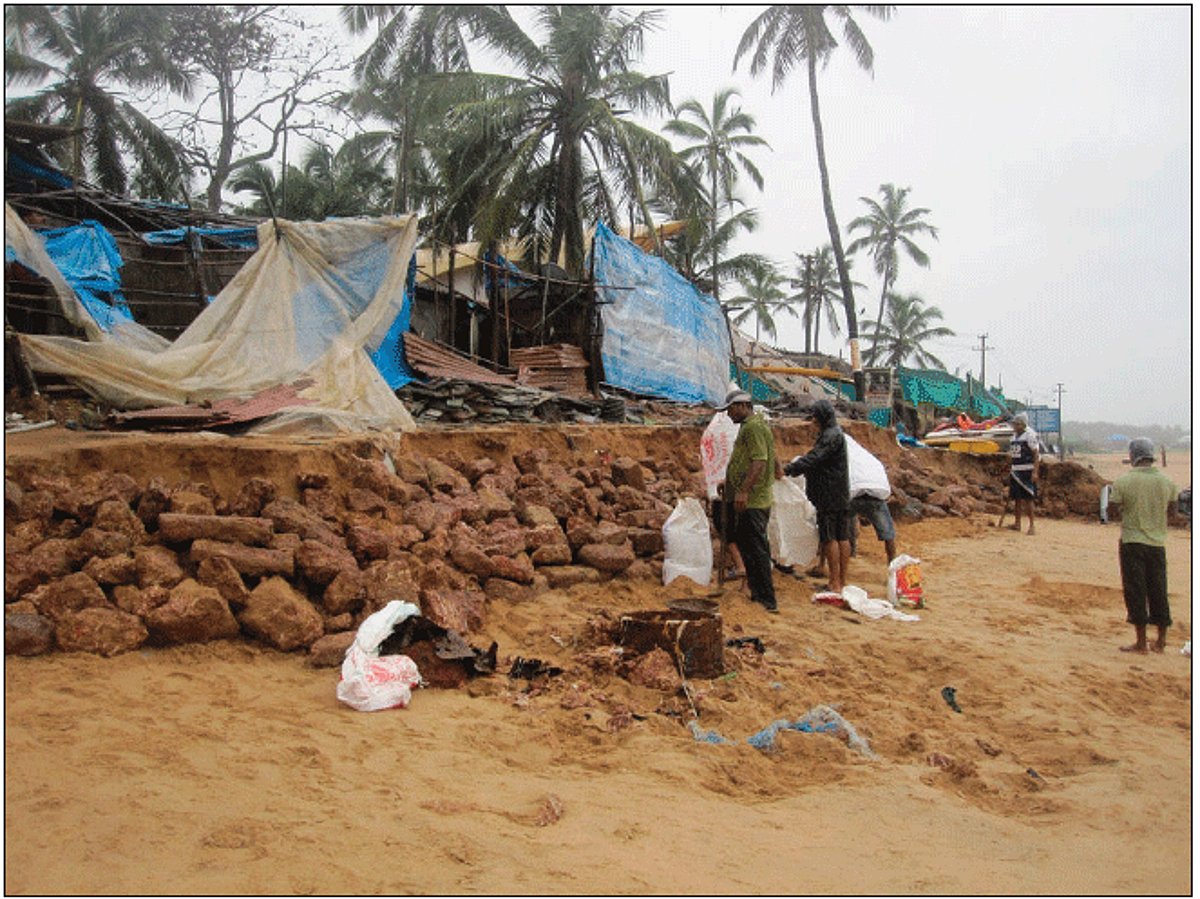 A house on the verge of collapse at Baga Beach due to soil erosion. Photo by Thomas Fernandes