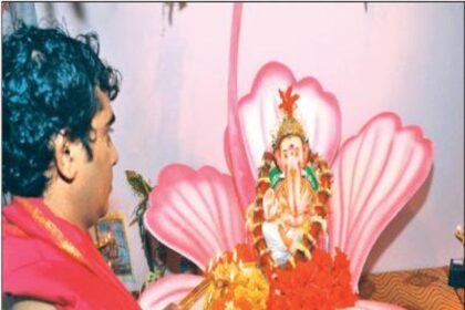 A man performing pooja on the occasion of Ganesh Chaturthi in the city.