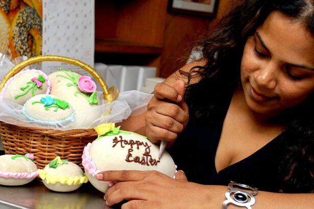A proprietor gives finishing touches to an easter egg at her pastry shop in Panjim.              Photo by Rozario Estibeiro