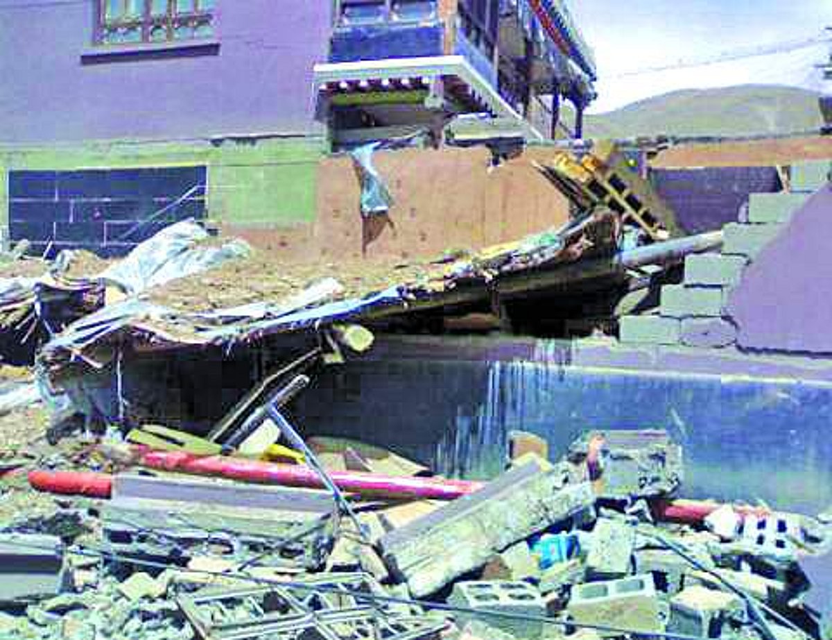 A structure in ruins after a major quake rattled Qinghai province of China.
