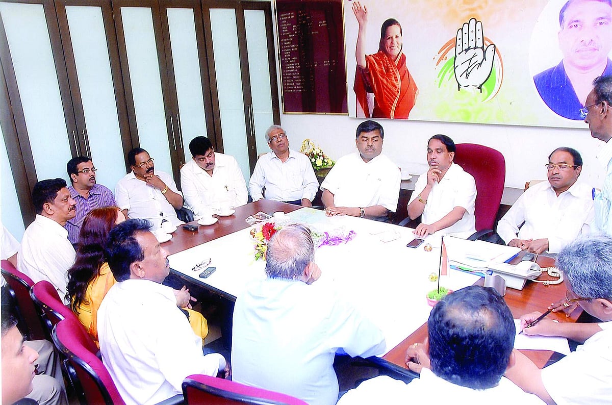 AICC General Secretary and in-charge of Goa, B K Hariprasad discussing the latest political scenario and organisational matters with GPCC President Subhash Shirodkar along with GPCC members and office bearers at Congress House, Panjim on Monday.