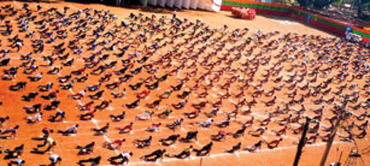 About 1,000 school students from Bicholim perform Surya Namaskara.