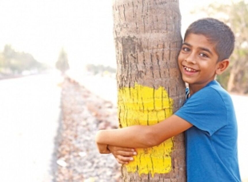 Activists protest felling of coconut trees along highway at Guirim