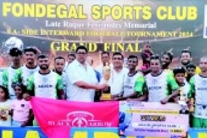 Agxem Sports Club lift Roque  memorial 9-a-side football trophy