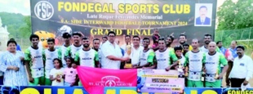 Agxem Sports Club lift Roque  memorial 9-a-side football trophy