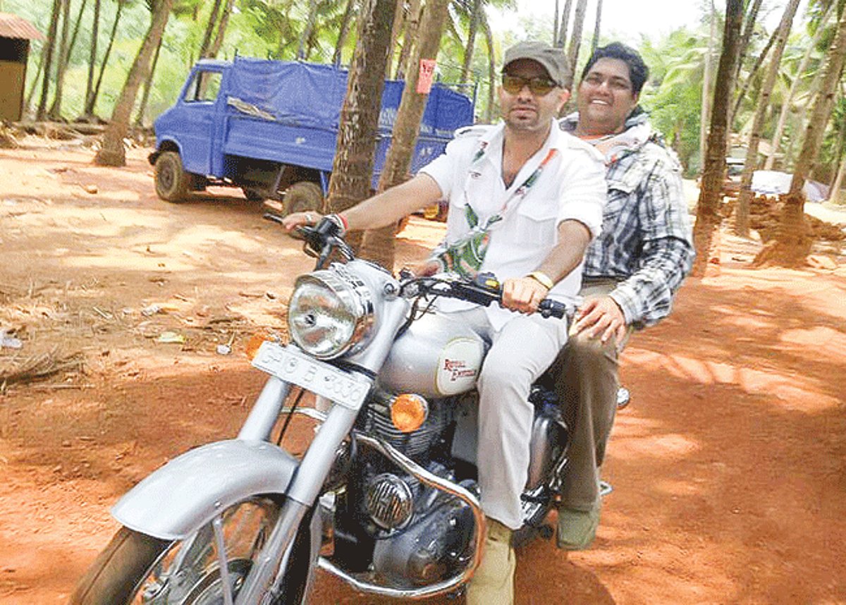 Aleixo Reginaldo Lourenco moves on a two-wheeler in the interiors of Canacona taluka during his road show on Saturday, along with youth leader Janardhan Bhandari.
