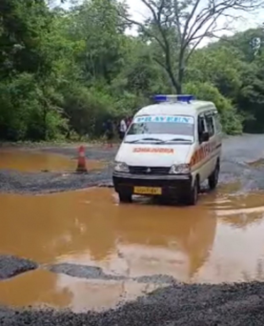 Ambulance struggles on pothole - riddled road at Surla while transporting patient from Goa to Belgaum