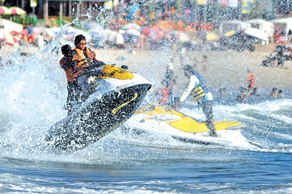 An Indian tourist enjoys a jet-ski ride at Baga beach on Sunday.  Jet Ski rides are one of the most popular water sports activities in Goa.