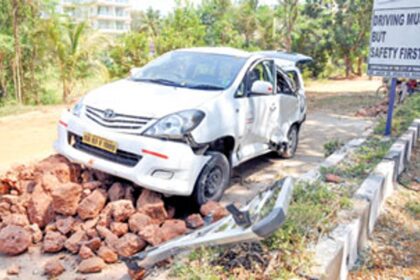 An Innova tourist vehicle proceeding to Dona Paula turned turtle and landed on rubble