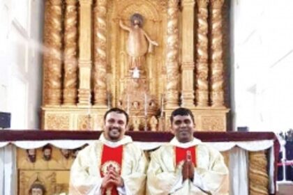 Archbishop Ferrao ordains 2 Jesuits as priests at Basilica