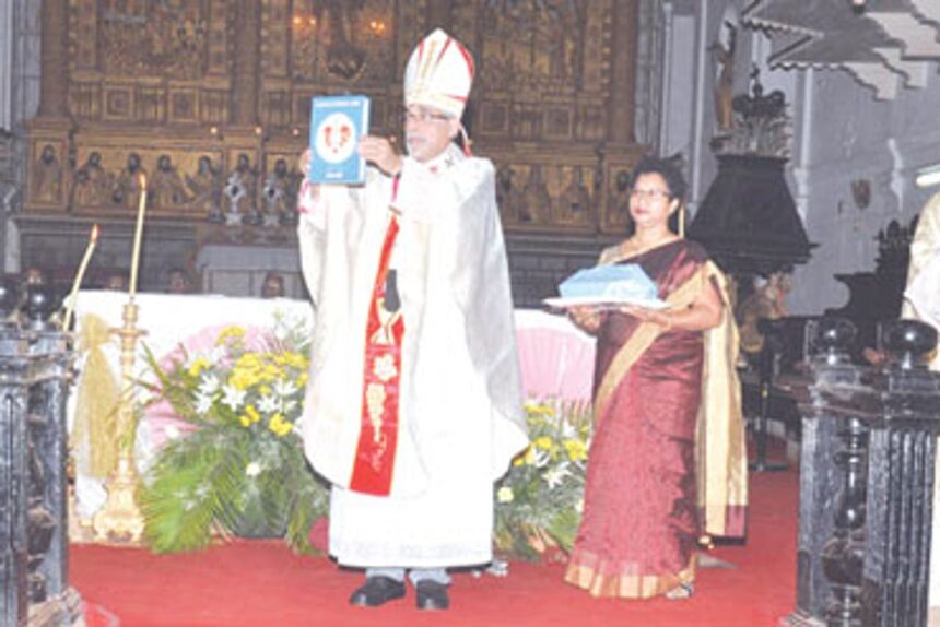 Archbishop Filipe Neri Ferrao releasing the Diocesan Pastoral Diary 2013-201