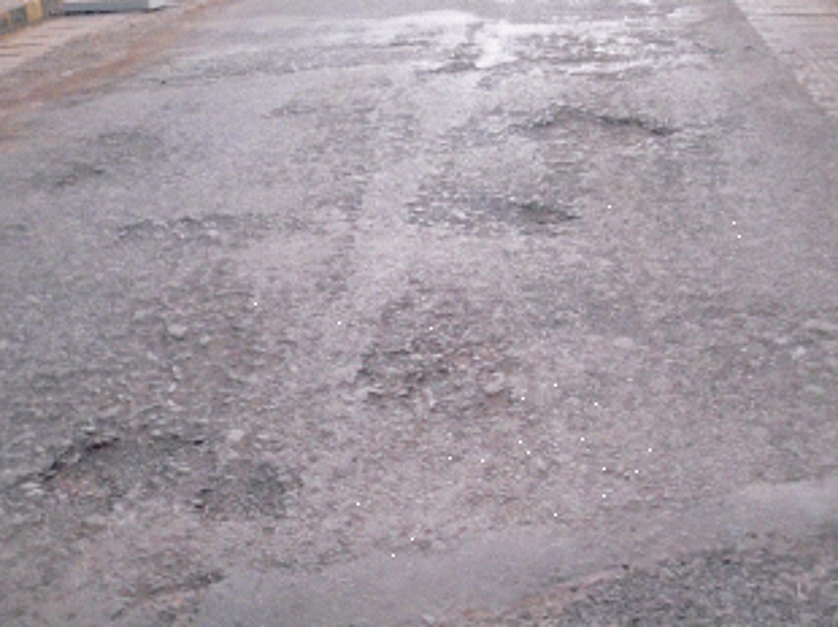 Assure prompt repairs of potholed roads