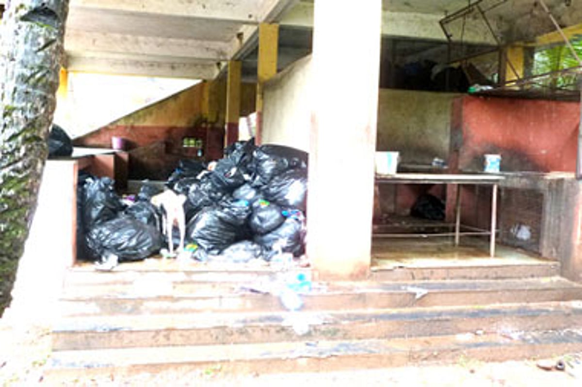 Bags containing garbage stacked in the market complex in Velsao.
