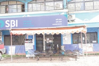 Bank officials provide shade and seating arrangement for customers
