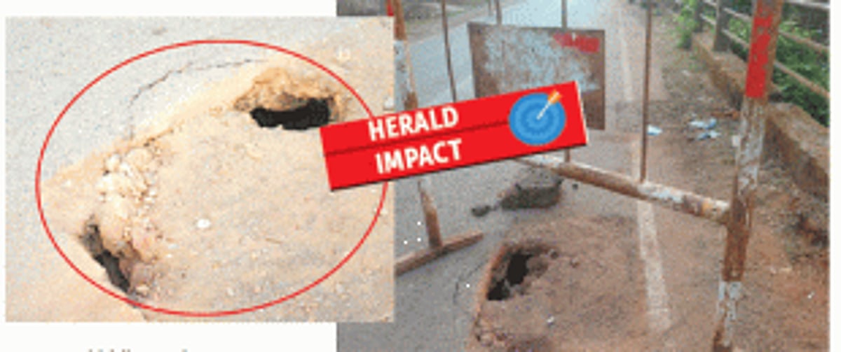 Barricade placed at damaged portion of road