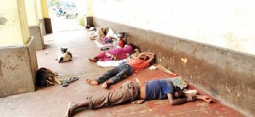 Beggar problems back outside MMC building
