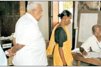 Birthday boy Dr Wilfred de Souza stands in queue to cast his vote in Saligao. Photos by Santosh Mirajkar and Anil Shankhwalker