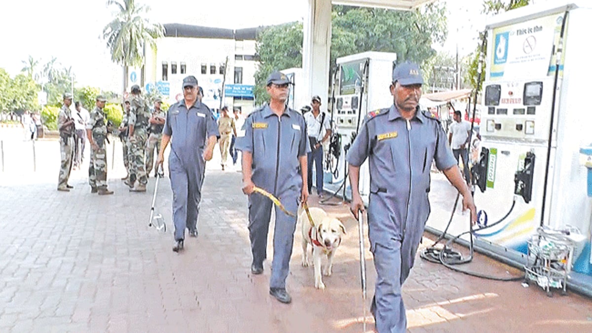 Bomb Disposal Squad conducting a search of the city petrol pumps following a bomb scare.