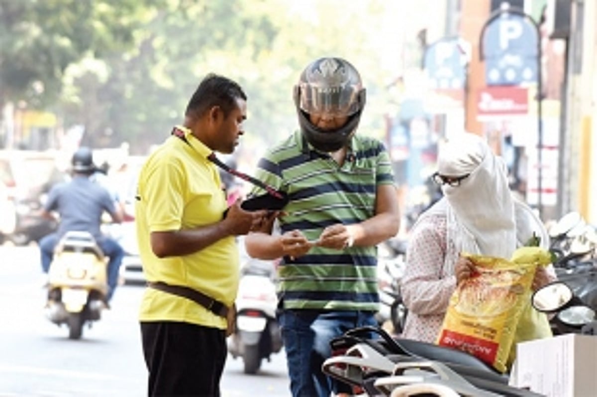 CCP warns pay parking contractor to avoid using its logo on T-shirts