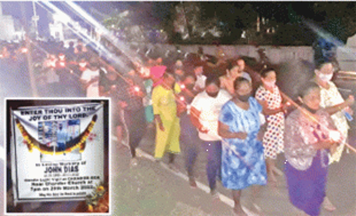 Candles soothe saddened hearts of Chandor locals who mourn the ghastly killing of their son John
