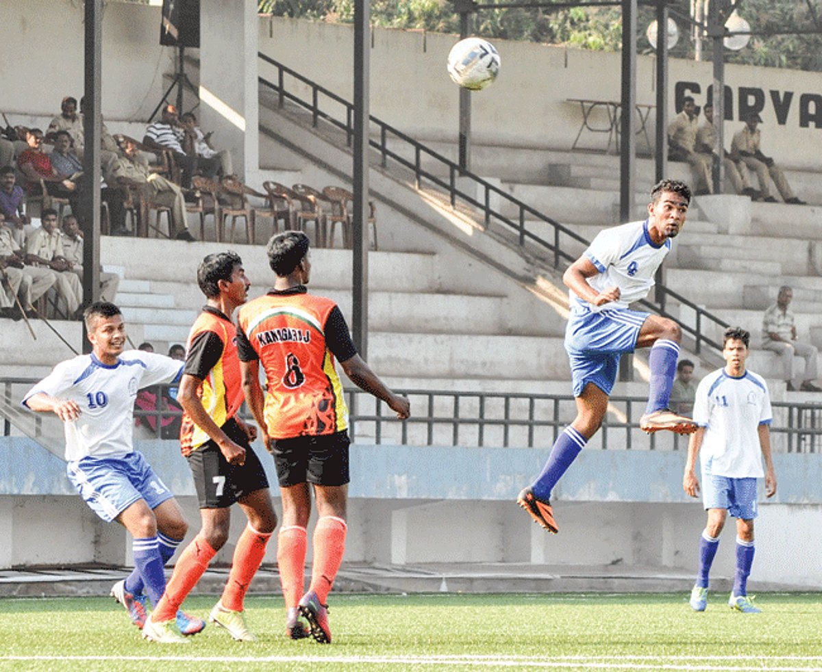 Captain of Daman and Diu Mangela Dayaram takes a header during a Santosh Trophy match at Duler stadium, Mapusa, on Saturday.