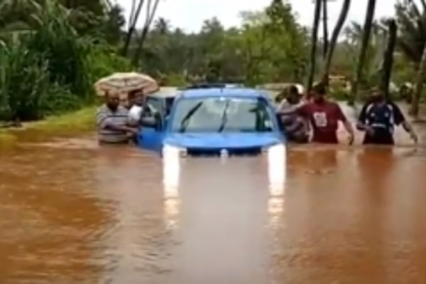 Car, occupants saved  from drifting at Paroda