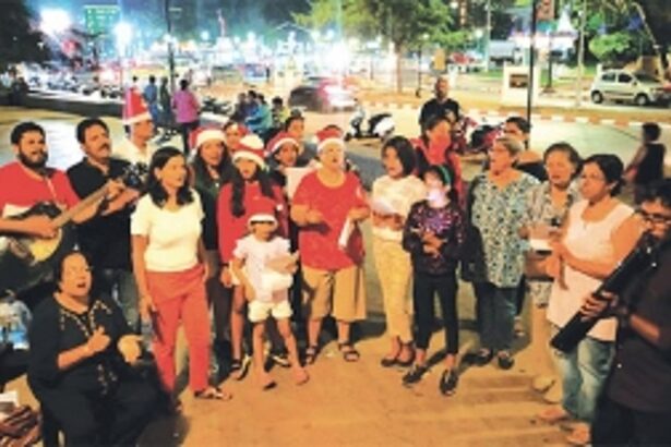 Caroling to set the Christmas mood