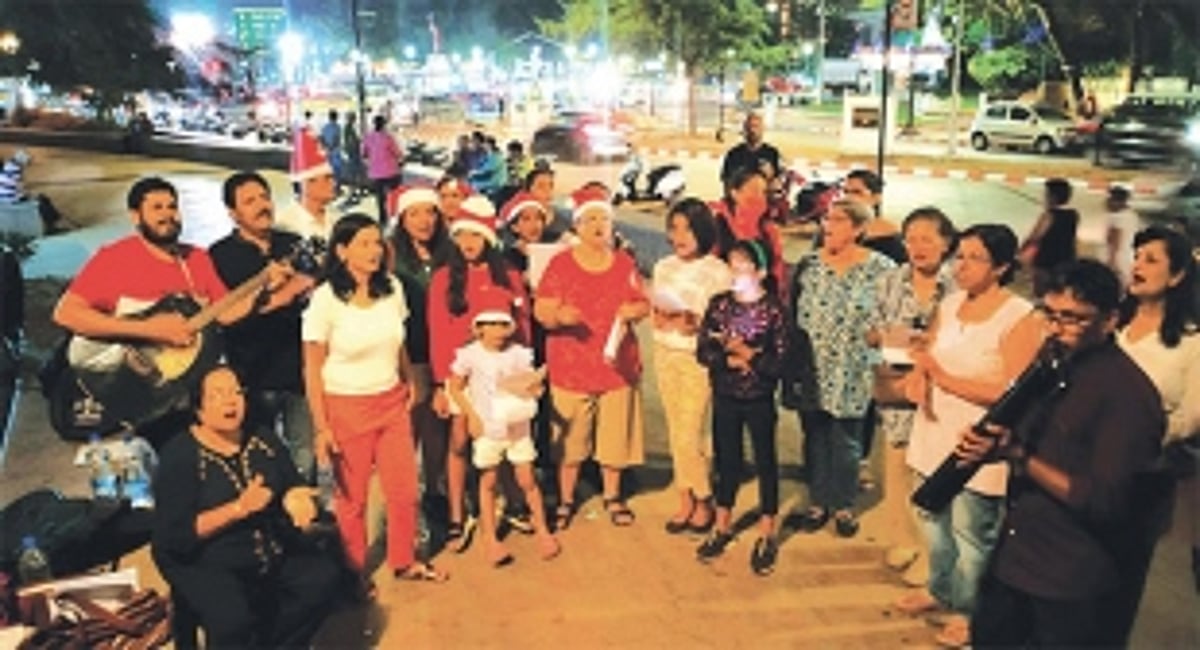 Caroling to set the Christmas mood