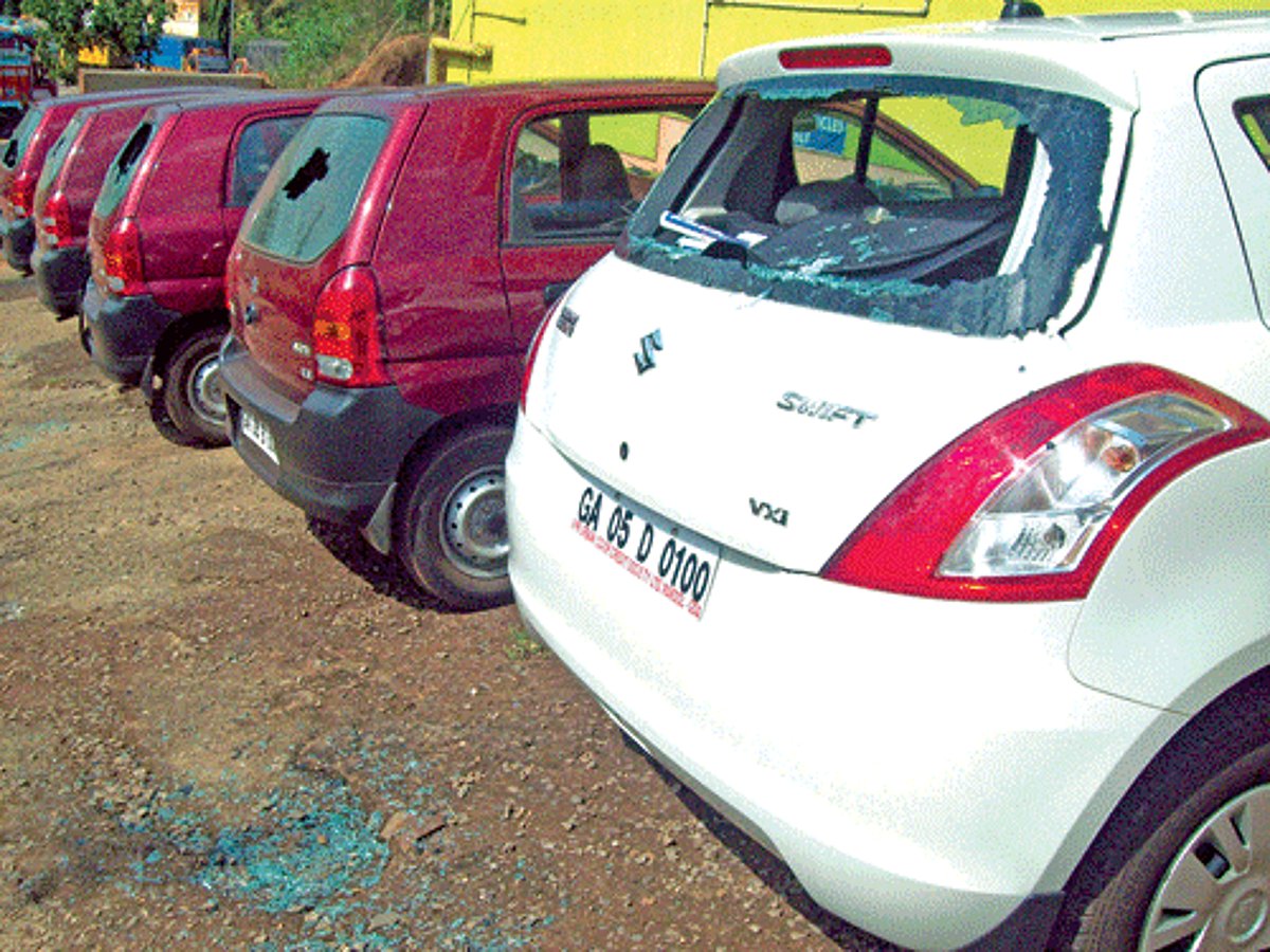 Cars that were damaged by a mentally unstable youth outside the VPK head office at Mardol.