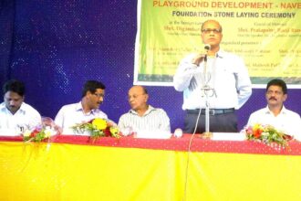 Chief Minister Digambar Kamat addresses the gathering at Navelim in the presence of Speaker Pratapsing Rane and MLA Pratap Gawas.