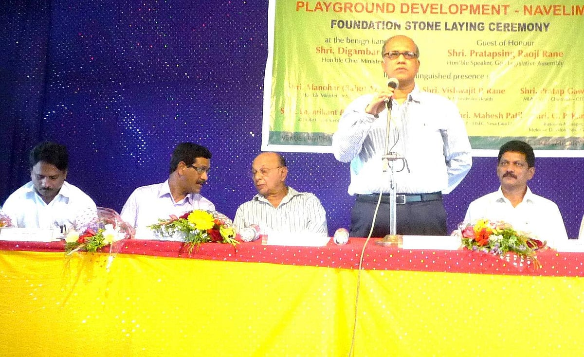 Chief Minister Digambar Kamat addresses the gathering at Navelim in the presence of Speaker Pratapsing Rane and MLA Pratap Gawas.