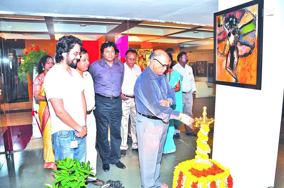 Chief Minister Digambar Kamat lighting the traditional lamp to mark the opening of the four-day South Asian Film Festival (SAFF) at Panjim on Friday.