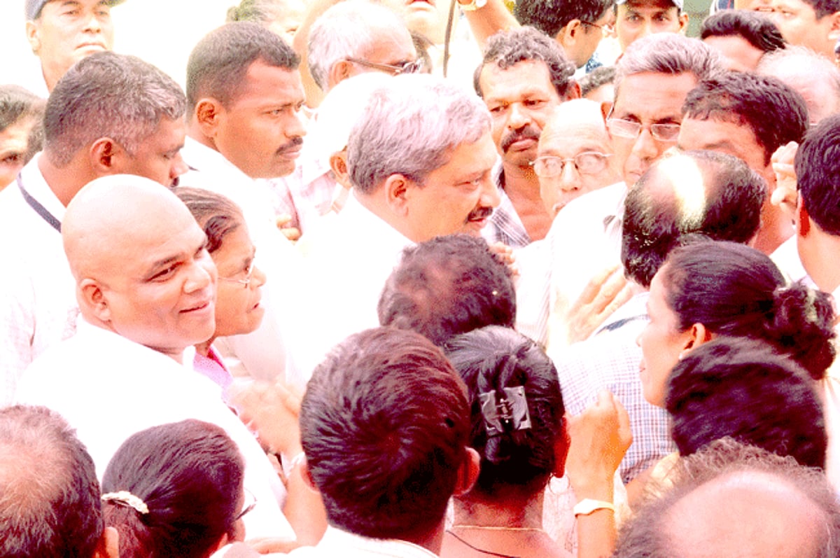 Chief Minister Manohar Parrikar interacting with Betalbatim residents during his visit to the village on Sunday.