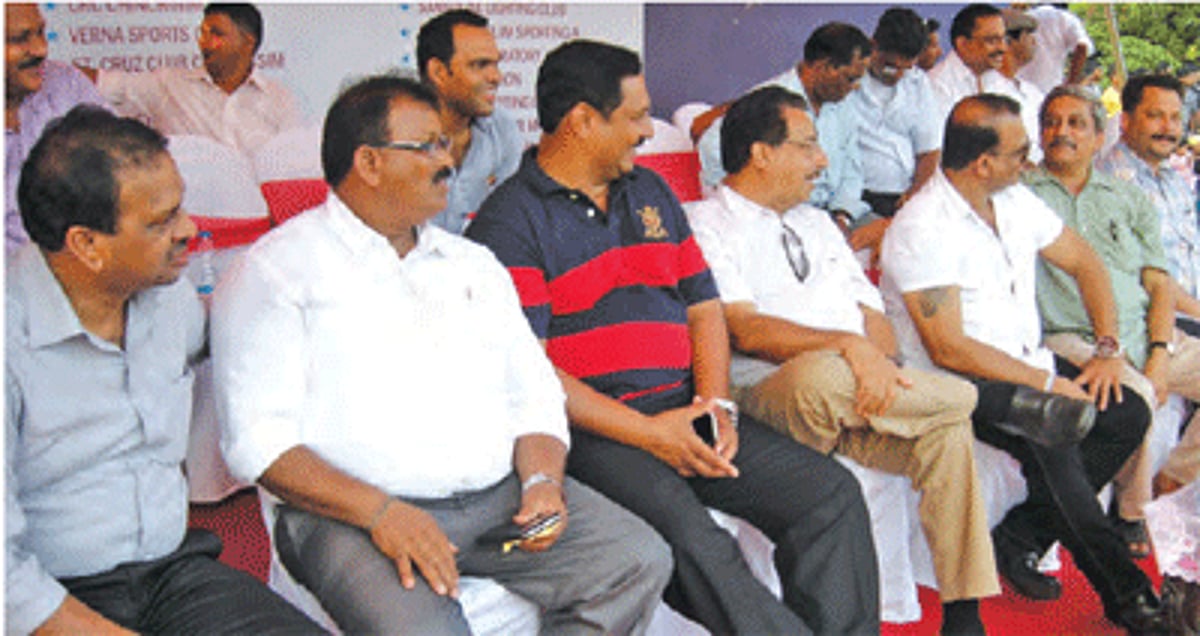 Chief Minister Manohar Parrikar shares a lighter moment with his ruling MLAs at the football finals at Navelim on Sunday