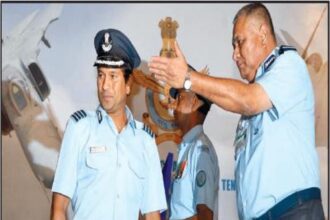 Chief of the Air Staff, P V Naik directing Group Captain Sachin Tendulkar to address the audience after conferring on him the honorary rank of Group Captain in New Delhi on Friday.