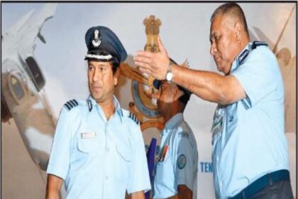 Chief of the Air Staff, P V Naik directing Group Captain Sachin Tendulkar to address the audience after conferring on him the honorary rank of Group Captain in New Delhi on Friday.