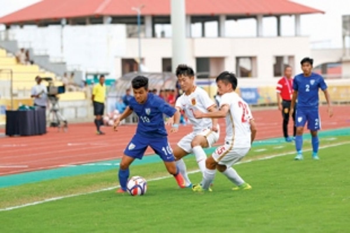 China steal last-gasp win over India